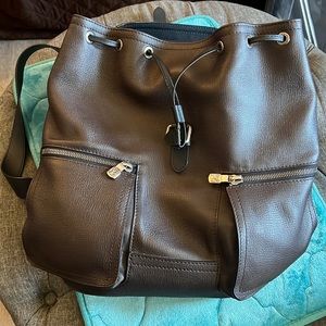 Louis Vuitton brown backpack and wallets  excellent condition